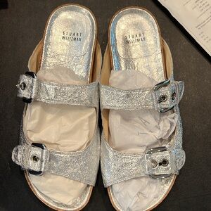 STUART WEITZMAN NWT Silver Foil Nappa Leather & Cork adjustable couture sandal.
